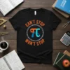 Black t-shirt with orange text "CAN'T STOP WON'T STOP" and a blue and orange Pi symbol with numbers around it