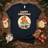 Navy t-shirt with "Cappy Christmas" text and a cute capybara in a Santa hat sitting in a mug of hot