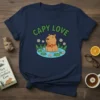 Capy Love t-shirt design with a cute capybara in water surrounded by flowers and lily pads