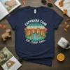 Capybara Club Eat Sleep Chill t-shirt design with group of capybaras by a pond and retro sunset background
