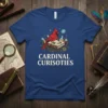 Cardinal Curiosities t-shirt design featuring a red cardinal on a book with scientific vials and gears, cream text