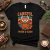 Careful I'm Big & Scary red panda Viking t-shirt with orange and teal shield graphic