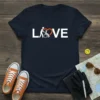 Caregiver Love Heart T-Shirt design featuring white text "LOVE" with a graphic of a person pushing a wheelchair inside an