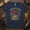 Carrying What Can't Be Dropped quote t-shirt with a red crab, treasure chest, anchors, and chains