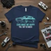 T-shirt with "CARS MAKE ME HAPPY YOU, NOT SO MUCH" text and a vintage muscle car graphic in teal outline