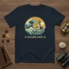 Casablanca wave design t-shirt featuring a stylized ocean wave, a lighthouse, and the city name in English