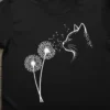 Cat Blowing Dandelions detailed graphic design printed on comfortable cotton t-shirt