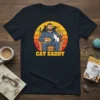 Cat Daddy t-shirt design featuring a man sitting with multiple cats, with text "CAT DADDY" below
