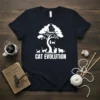 Cat Evolution graphic tee with tree and evolving cat silhouettes, text "CAT EVOLUTION" in bold white letters