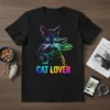 Black t-shirt with "CAT LOVER" text in rainbow neon glow and a stylized cat graphic