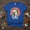 Cat Lover t-shirt with a Siamese cat sitting in front of a colorful rainbow and hearts graphic
