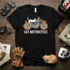 Black t-shirt with "CAT MOTORCYCLE" text and a cartoon illustration of cats riding a motorcycle