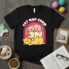 Black t-shirt with "Cat Nap Crew" text above a stack of three cute cats with a rainbow background
