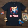 Superhero cat with "CAT POWER!" text on a navy blue t-shirt, featuring red and blue lightning bolts