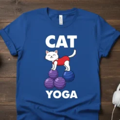White cat in red tank top balancing on purple and blue yoga balls with "CAT YOGA" text