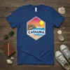 Retro Catalina Island t-shirt design featuring beach, ocean, mountains, and sun graphic with text "CATALINA Island"