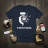 Catatsrophe. funny cat pun t-shirt design featuring a distressed cat graphic and text "Catatsrophe."