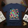 Navy blue t-shirt featuring colorful CatmanArt.com design with many black cats and abstract buildings, including the text CatmanArt.com