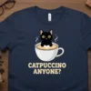 Catpuccino Anyone? text with a black cat in a coffee cup design on a navy t-shirt