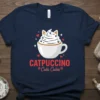 CATPUCCINO Cuki Cukis t-shirt design featuring a cup of coffee with cat ears and paw prints, surrounded by hearts and