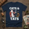 Cats & Tats T-Shirt design featuring two tattooed cats, one holding a tattoo gun. White text reads "CATS & TATS"
