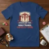 Cavalier Care Team Highly Trained Paw-fectly Loving text on a navy t-shirt with cartoon Cavalier King Charles Spaniels wearing nurse