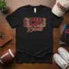 Black t-shirt with "CCHS Rebels" in maroon and leopard print, representing school spirit for CCHS