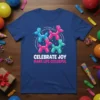 T-shirt with "Celebrate Joy Make Life Colorful" text and colorful balloon dog graphics