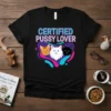 Certified Pussy Lover text with three cartoon cats in a heart shape graphic on a black t-shirt
