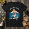 Black t-shirt with "C'est Pas La Capitale C'est Marseille Bébé" text and a French Bulldog wearing sunglasses and holding a