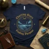 Navy t-shirt with "Charting Stars Finding Purpose" quote and celestial graphic of a person looking at stars over the ocean