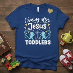 Chasing After Jesus and TODDLERS text with cartoon toddlers and a cross graphic on a navy blue t-shirt