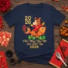 T-shirt with "Chúc Mừng Năm Mới Xuân Bính Ngọ 2026" text, a horse on a koi fish, firecrackers, and gold