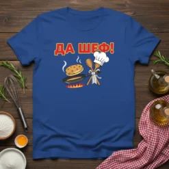 Blue t-shirt with "ДА ШЕФ!" text and cartoon graphic of a chef cooking pancakes in a pan