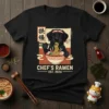 Black Labrador wearing a chef's bandana eating ramen noodles, with "Chef's Ramen Est. 2024" text