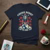 Cherie Berry Lifts Me Up quote with rocket, Earth, and flowers on a navy t-shirt, celebrating women in science