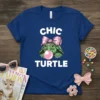 Chic Turtle T-Shirt with a cute turtle wearing glasses and a pink bow blowing bubblegum