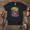 Chill Grill t-shirt design featuring a smiling cartoon barbecue with flames and sunglasses, text "CHILL GRILL" in bold letters