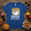 Chillin' with my lomies t-shirt design featuring a cartoon chicken wearing sunglasses, holding a hot dog and giving a thumbs