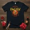 T-shirt design featuring "Chinatown's Best Faw Kew Chinese Chicken 24/7 Free Delivery" text and a cartoon chicken in a bowl