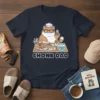 Chonk Dad t-shirt featuring a cartoon cat chef sitting at a table laden with food, with "CHONK DAD" text below