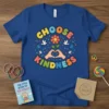 Choose Kindness t-shirt with colorful retro font, doves, and flower graphic