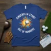 Cinderella Story Out Of Nowhere text with golf ball explosion graphic on a blue t-shirt