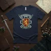 Clan MacDougall Fortiter t-shirt featuring a lion rampant crest and Scottish tartan background