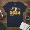 Class of 2024 graduation t-shirt with a rocket blasting off, featuring bold yellow text