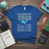 Class of 2038 graduation t-shirt with checkboxes for grades K through 12, featuring a rocket launching from an open book