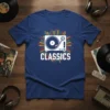 T-shirt with the word CLASSICS in bold white font below a white graphic of a record player, surrounded by colorful