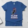 Claw Marks t-shirt with a black cat reaching up with red claw marks above the text "CLAW MARKS"
