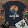 T-shirt with "Climb On!" text and cartoon cat rock climbing design