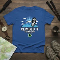 Climbed It Kilimanjaro Tanzania t-shirt design featuring a mountain, footprint, and flag